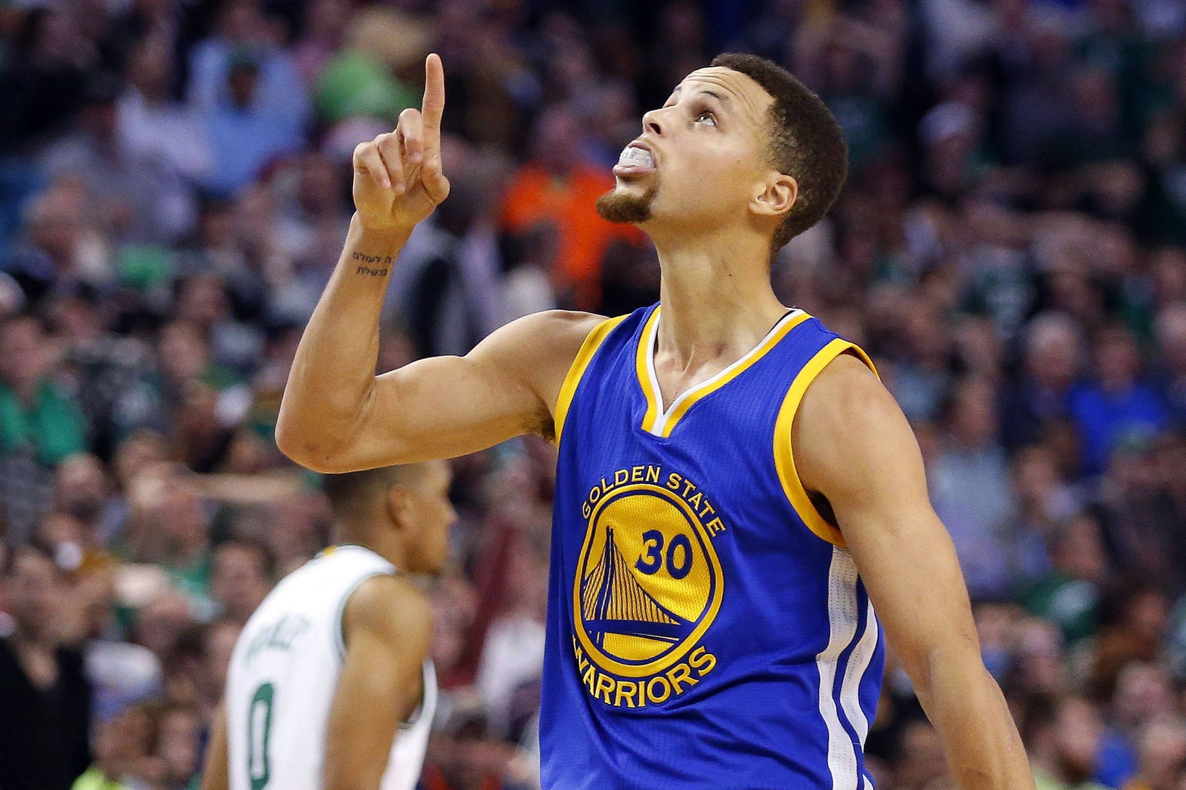 Steph Curry Points to the Sky
